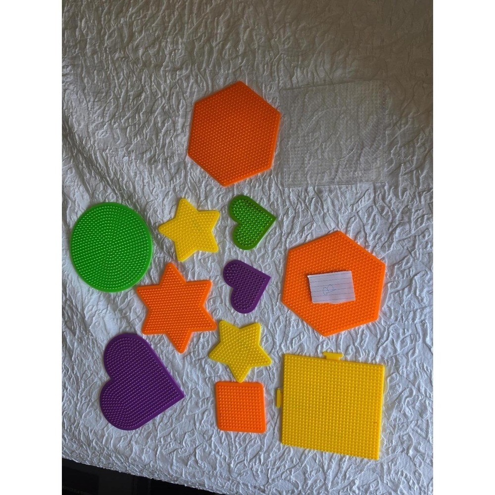 Lot B Perler bead pegboards in various shapes and bright colors